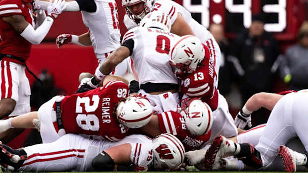 Malcolm Hartzog and Luke Reimer and Ty Robinson tackle vs Wisconsin 2022 Nebraska football